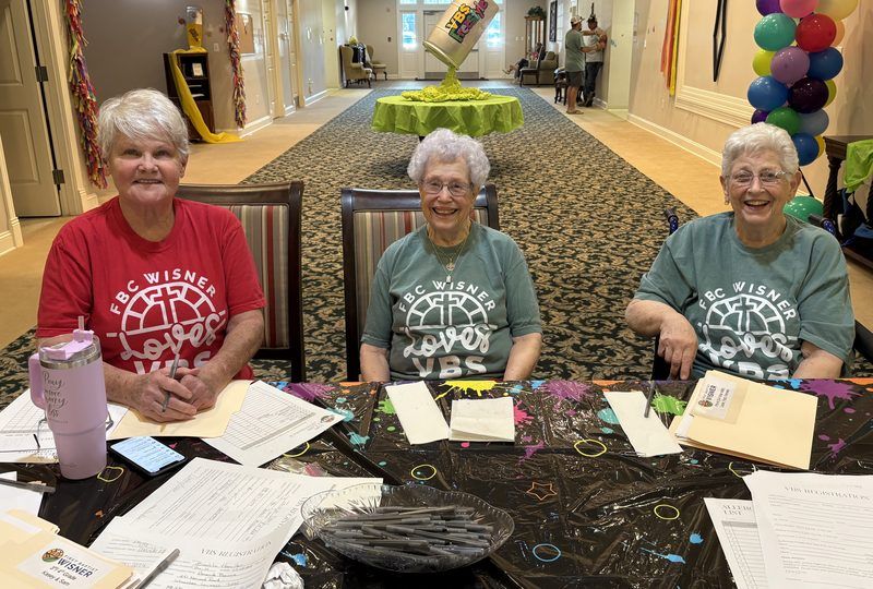 Diverse multigenerational group serving together